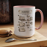 A white ceramic mug with a pink handle and interior, featuring a circular graphic that reads 'IT'S A THROAT PUNCH KIND OF DAY' around a clenched fist illustration. The mug sits on a wooden board with a spoon and a macaron nearby, with a dark background and blurred coffee beans in a jar.