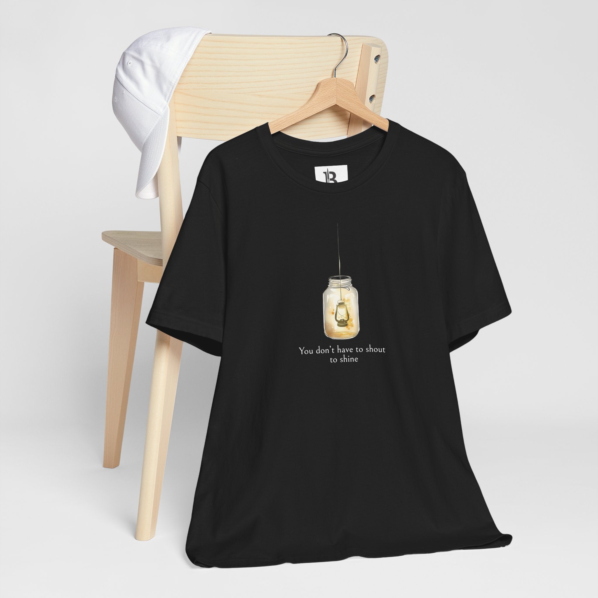 Minimalist Lantern T-Shirt – “You Don’t Have to Shout to Shine” Aesthetic Tee