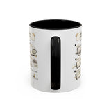 A white ceramic mug with a black interior and a black handle, featuring printed coffee-themed illustrations on the side.