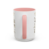 A white ceramic mug with a pastel pink handle and interior, featuring a vertical line-art illustration of a coffee cup and text on the side, shown on a clean white background.