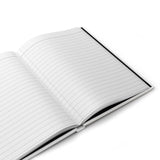 Open hardcover lined journal for daily reflection and mindful writing